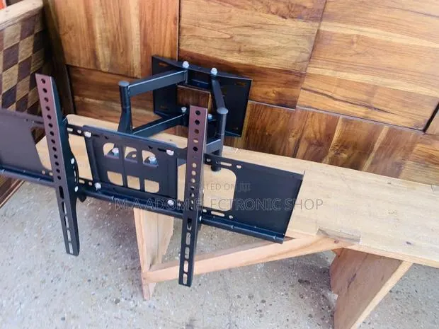 Full Motion Felixible TV Wall Mount for Most 32-75 Inch. · Photo 1