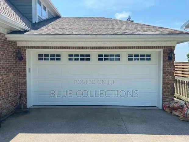 Automated Garage Door With Remote · Photo 1