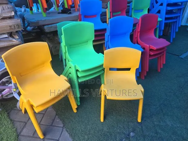 Vibrant Yellow Plastic Nursery Chair. · Photo 1
