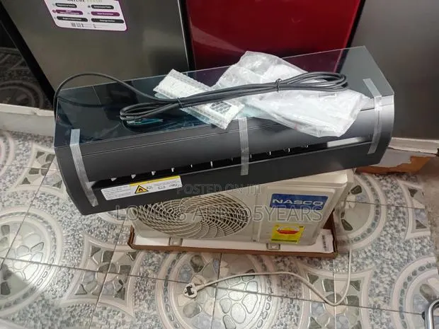 Nasco 1.5hp Reflective Glass Front Air Conditioning Unit . · Photo 1