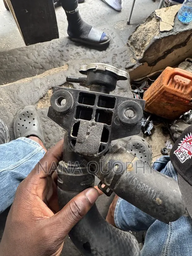 Engine Coolant Radiator Filler Neck · Photo 1