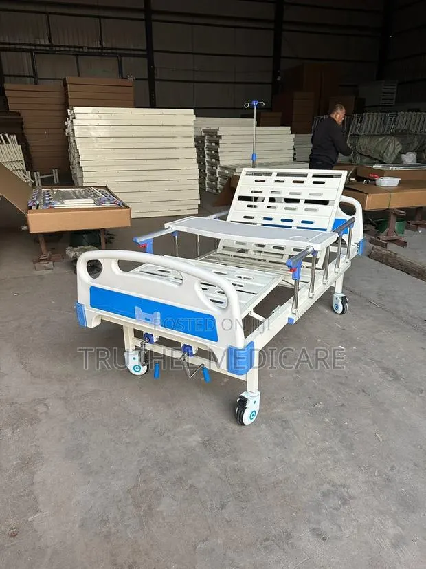 Hospital Bed - Two Cranks (Free Mattress, Drip Stand, Table) · Photo 1