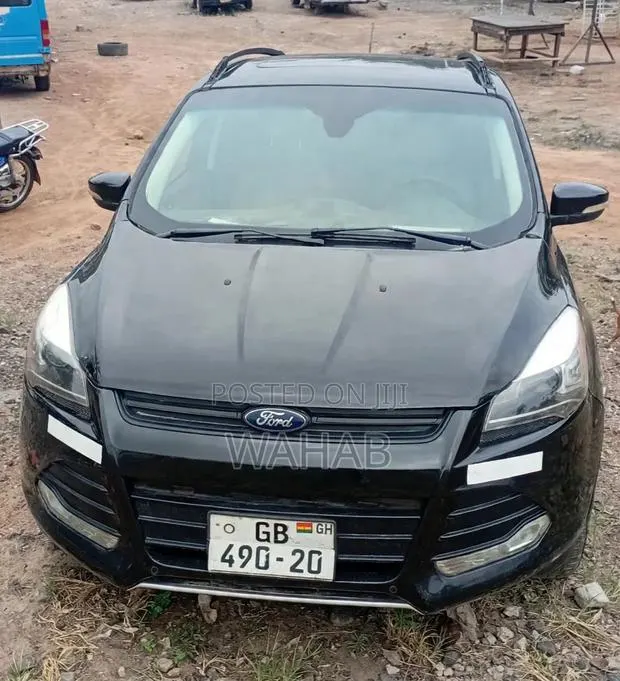 Ford Escape Titanium 4dr SUV (1.6L 4cyl Turbo 6A) 2014 Black · Photo 1
