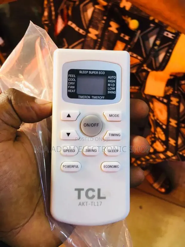 TCL AC Remote: Your Cooling Companion · Photo 1