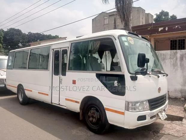 Car Rental- Coaster Bus 29 Seater for Rent · Photo 1