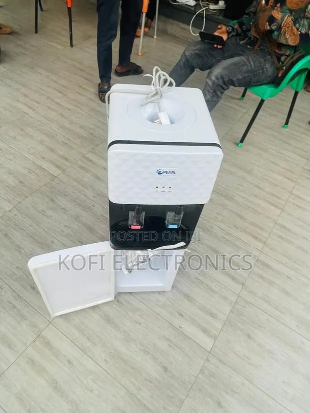Hot Cold Water Dispenser With Bottom Fridge Cabinet · Photo 1