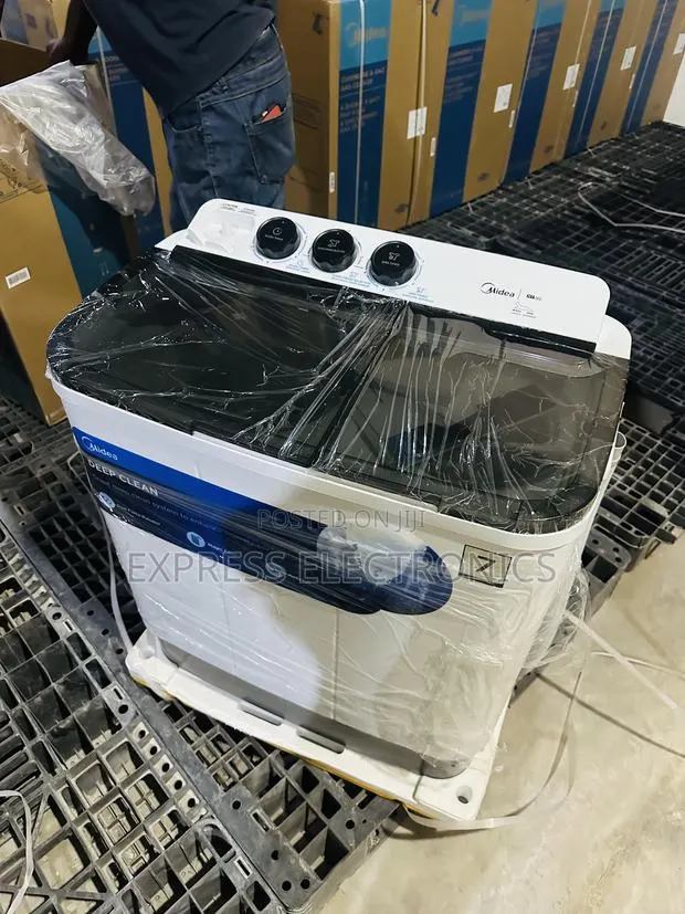 Lovely New White 7kg Topload Wash and Spin Midea · Photo 1