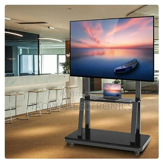 36• -Movement, 32-75 Inch Mobile Tv Stand · Photo 1