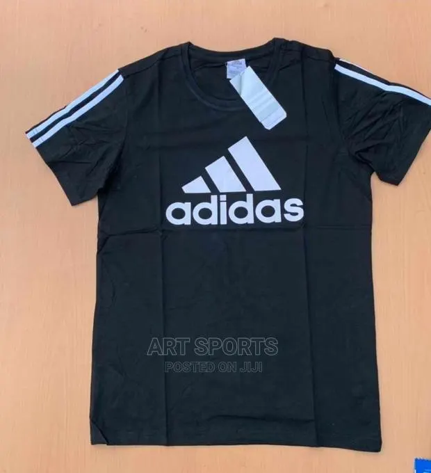 Adidas Tops. · Photo 1