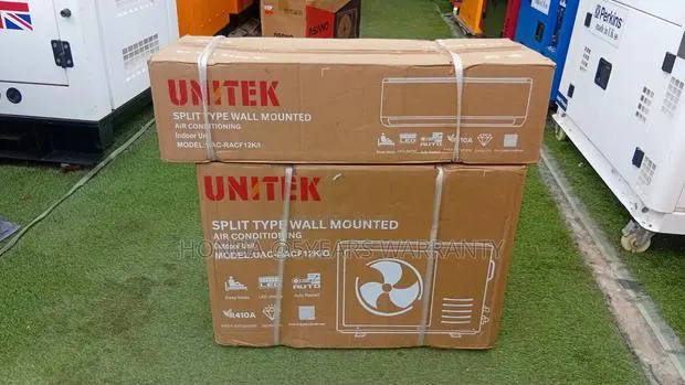 Super Cooling UNITEK 1.5HP Air Conditioner 1.5HP AC · Photo 1
