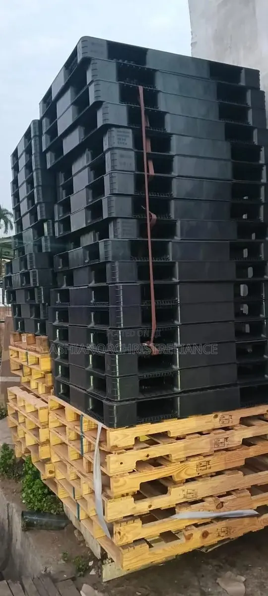 Wooden and Black Rubber Pallets · Photo 1