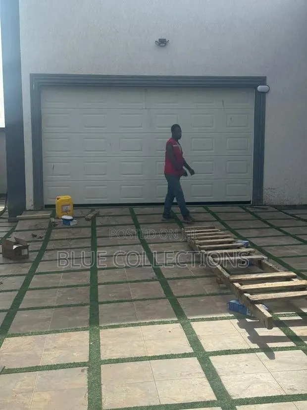 16ft Smart Garage Door and Smart Motor · Photo 1