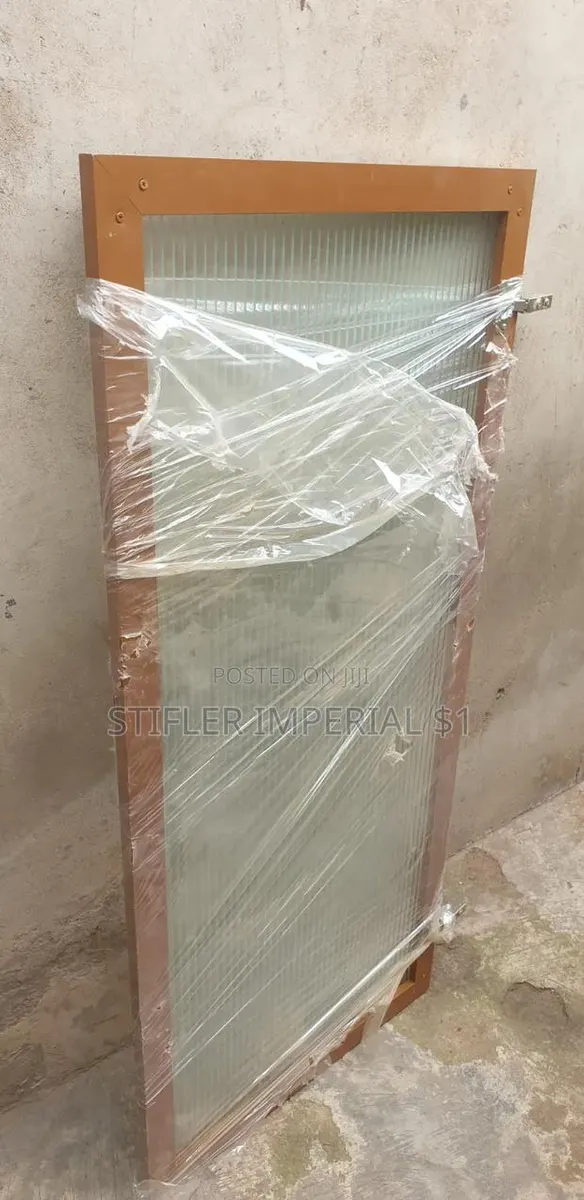 Gold Glass Door With Fluted Glass Pannel · Photo 1