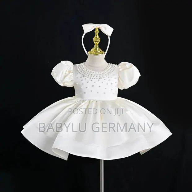 Premium Off-White Dress With Free Hair Accessory · Photo 1