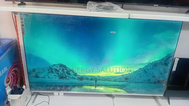 Green 75" Smart Television – Your Home Cinema · Photo 1