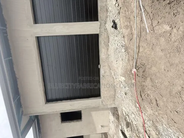 Automatic Garage Door With Opener · Photo 1