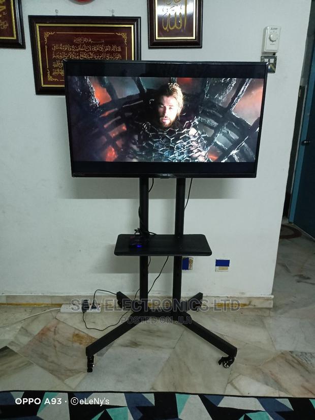 Highly Adjustable TV Cart Stand 32-65 Inch · Photo 1