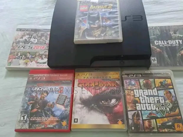 Playstation 3 With Cd Games · Photo 1
