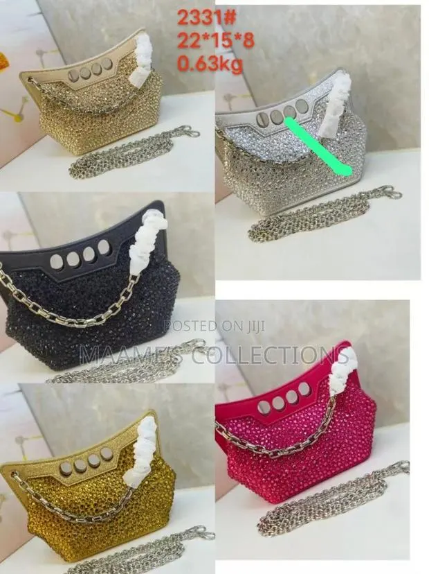 Alexander McQueen Four-Ring Crystal Clutch Bag · Photo 1