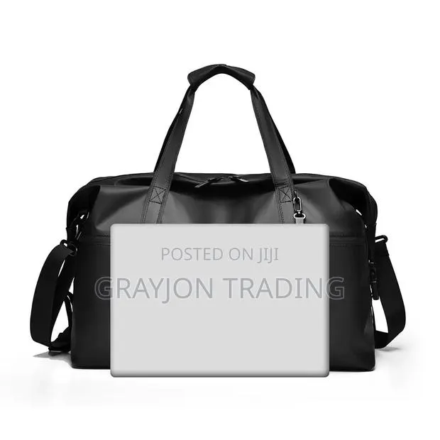 Duffel Water/Dust Proof Leather Bag · Photo 1