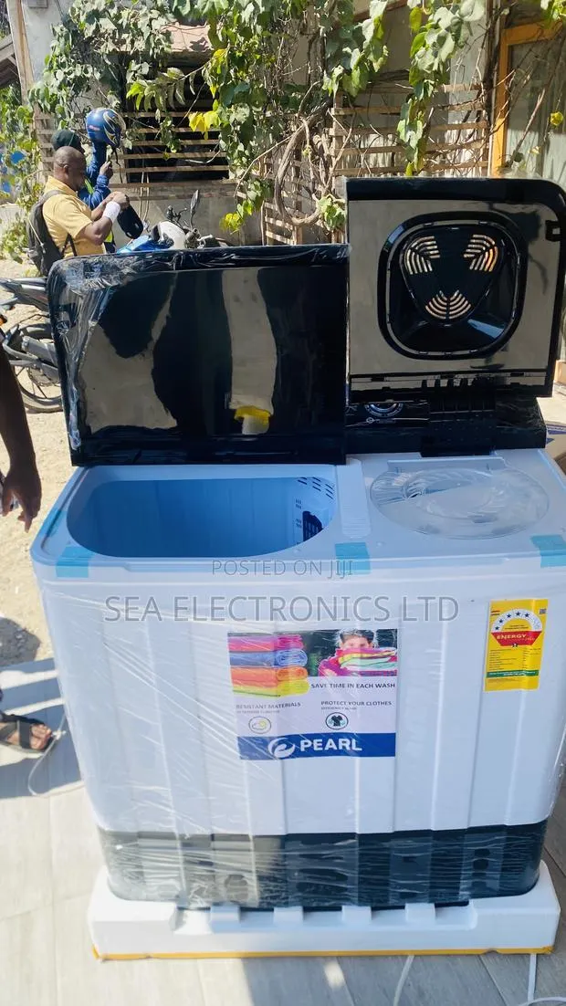 New Condition Pearl Brand 18 Kg Top-Load Load · Photo 1