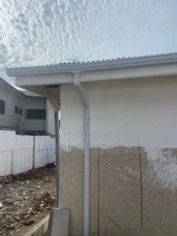Water Collectors and Downpipe. · Photo 1