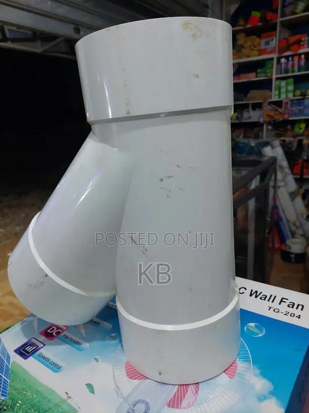 White PVC Pipe Elbow Fitting · Photo 2