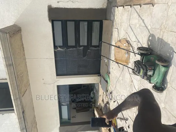 Double Automated Garage Door · Photo 1