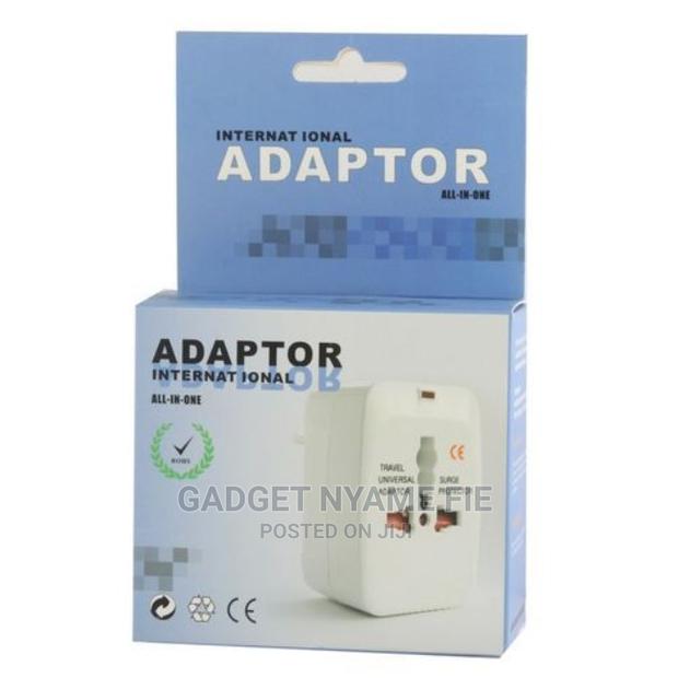 Universal World Charger Adapter Plug All in One Travel Ac Po · Photo 2