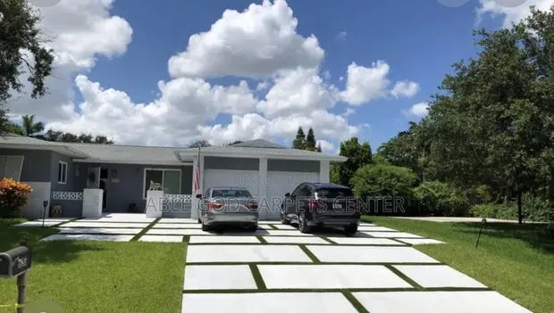 Concrete Slabs Green Grass Astroturf · Photo 1