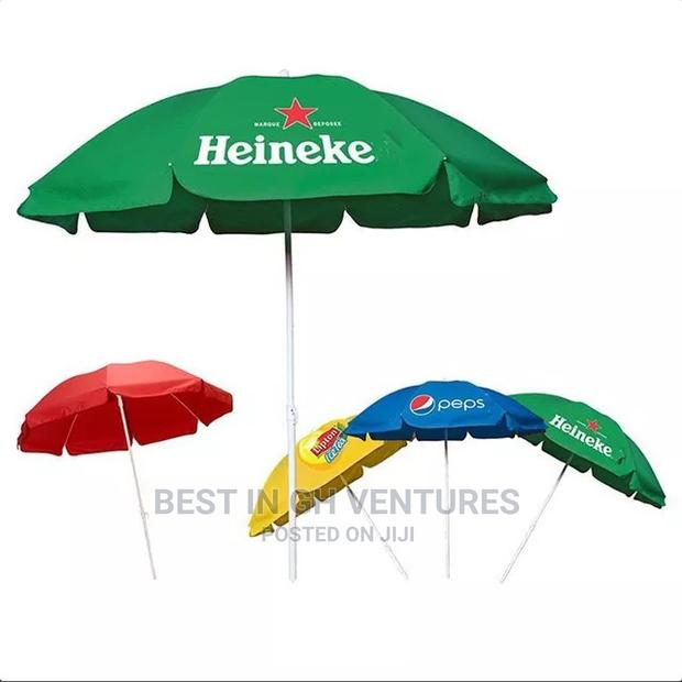 Infront of Shop Umbrellas · Photo 1