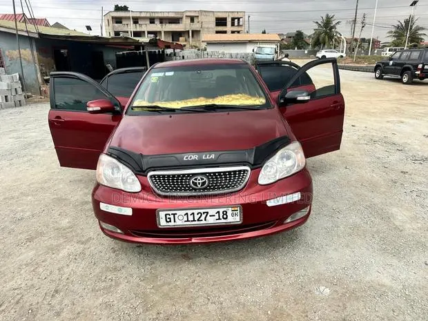 Toyota Corolla 2003 Red · Photo 1