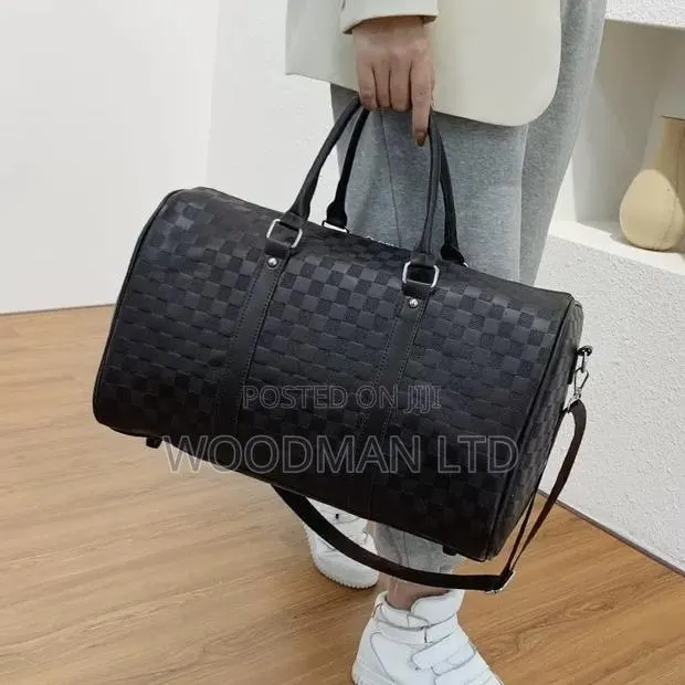 Leather Traveling Hand/Shouder Luggage · Photo 1