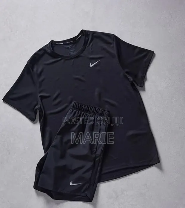 Nike Miler Dri-Fit Running Top · Photo 1