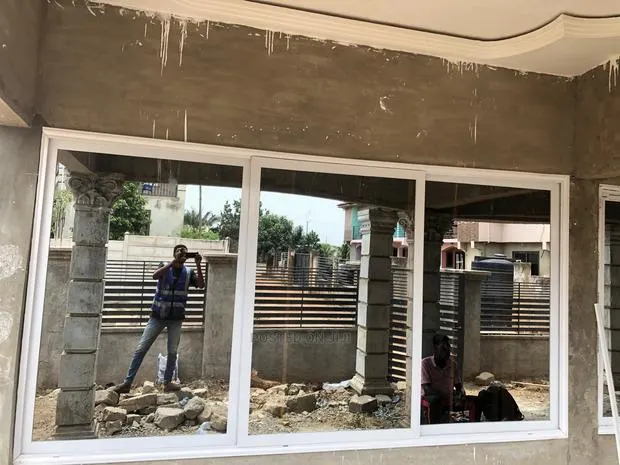White Aluminum Sliding Glass Window With Mirror Glass Type · Photo 1