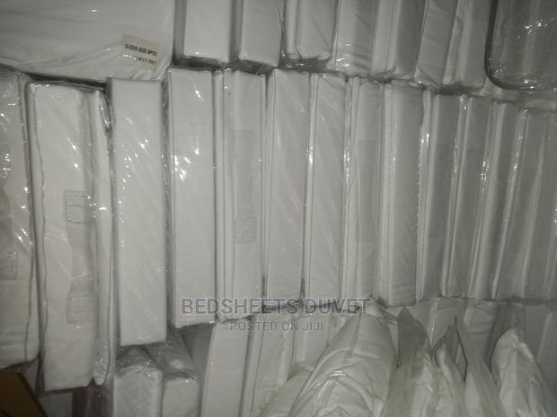White Fitted Bedsheet · Photo 1
