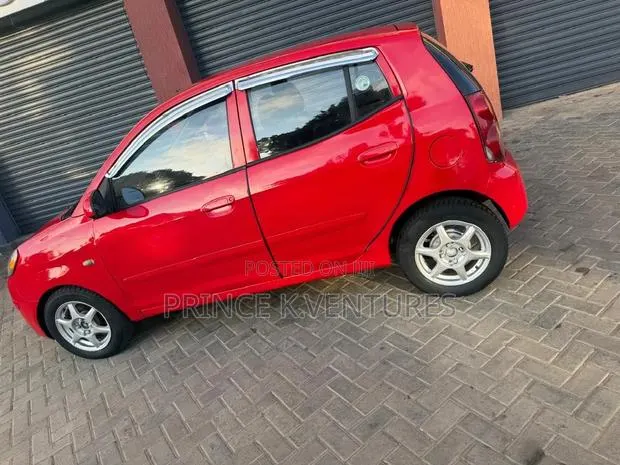 Kia Morning 2010 Red · Photo 1