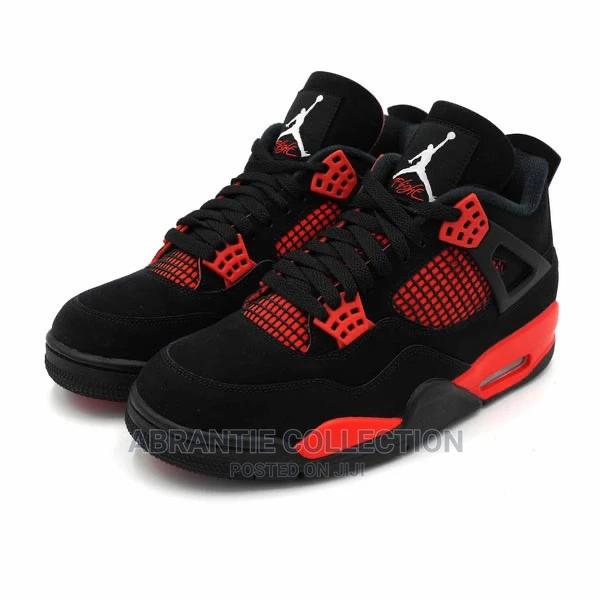 Air Jordan Retro 4 Thunder Red · Photo 2