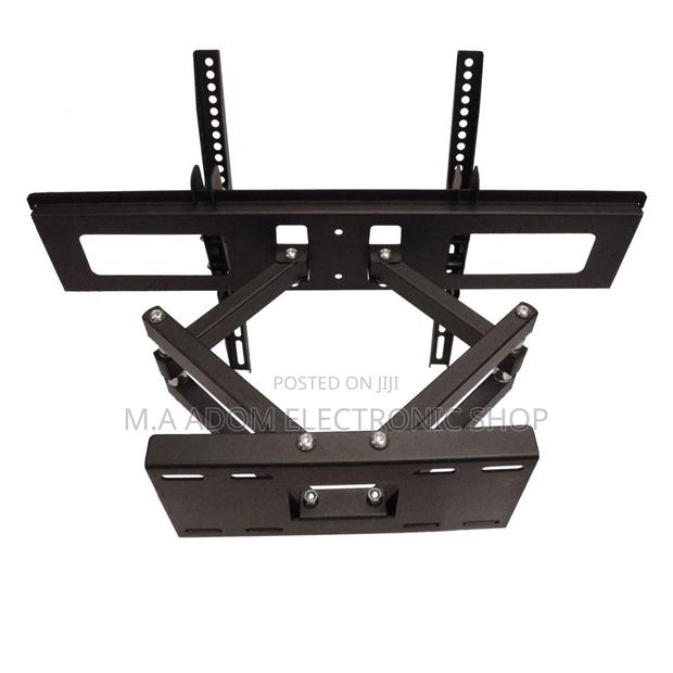 Adjustable Double Arm Swivel Full Motion 32”-65” · Photo 1
