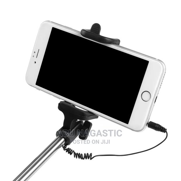 Selfie Stick Tripod With Remote Control · Photo 2
