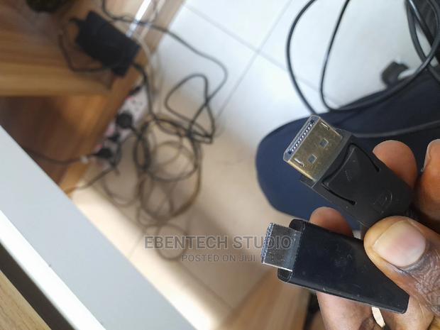 Display Port (Dp) to HDMI Cable · Photo 8