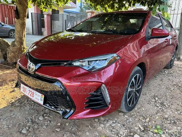 Toyota Corolla LE Eco (1.8L 4cyl 2A) 2019 Ivory · Photo 1
