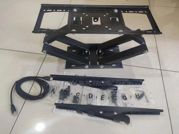 Dual Arm Full Motion Tv Bracket 32”-70” Tv Screens · Photo 1