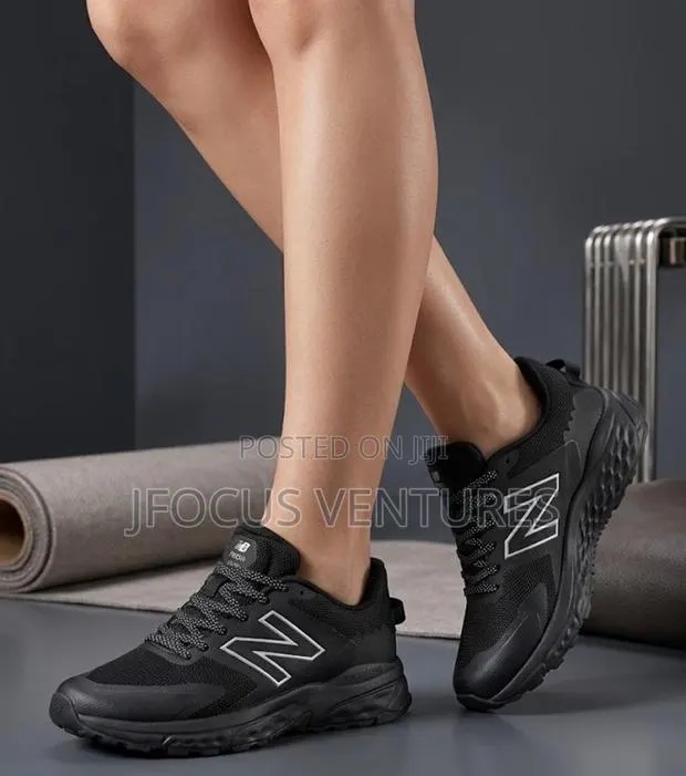 New Balance Black/White Sneakers · Photo 1