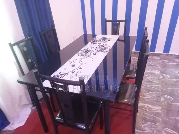 Dinning Table With 6 Chairs · Photo 1
