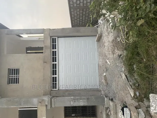 Quality America Garage Door · Photo 1