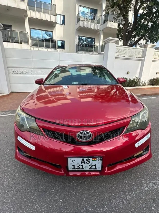 Toyota Camry SE 4dr Sedan w/Prod. End 11/13 (2.5L 4cyl 6A) 2014 Red · Photo 1