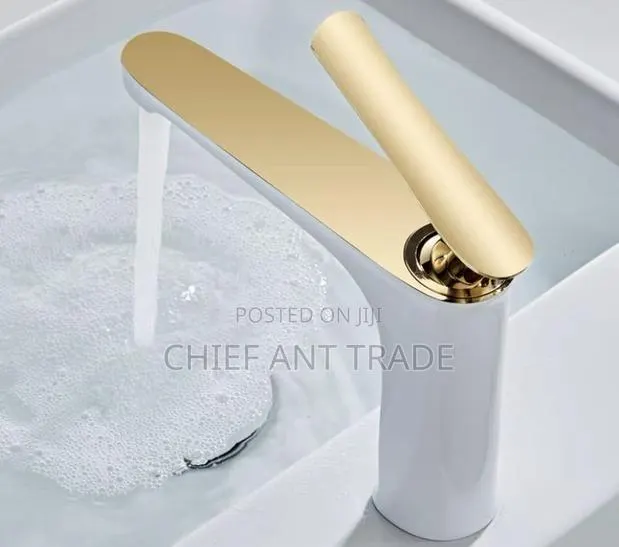 Faucet. Hot Cold. Gold and White Page-9 · Photo 1