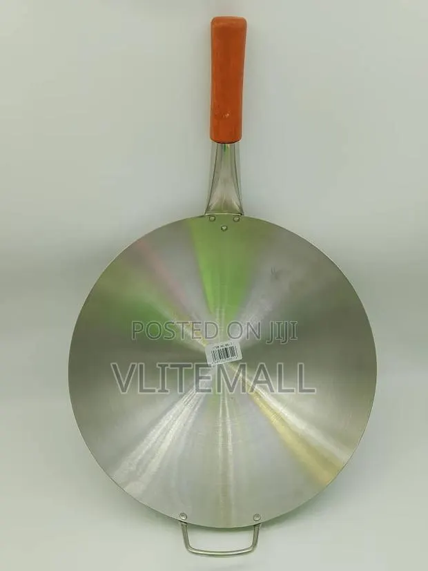 An Aluminum Tawa (Flat Frying Pan) Long Wooden Handle a Small Loop. · Photo 1