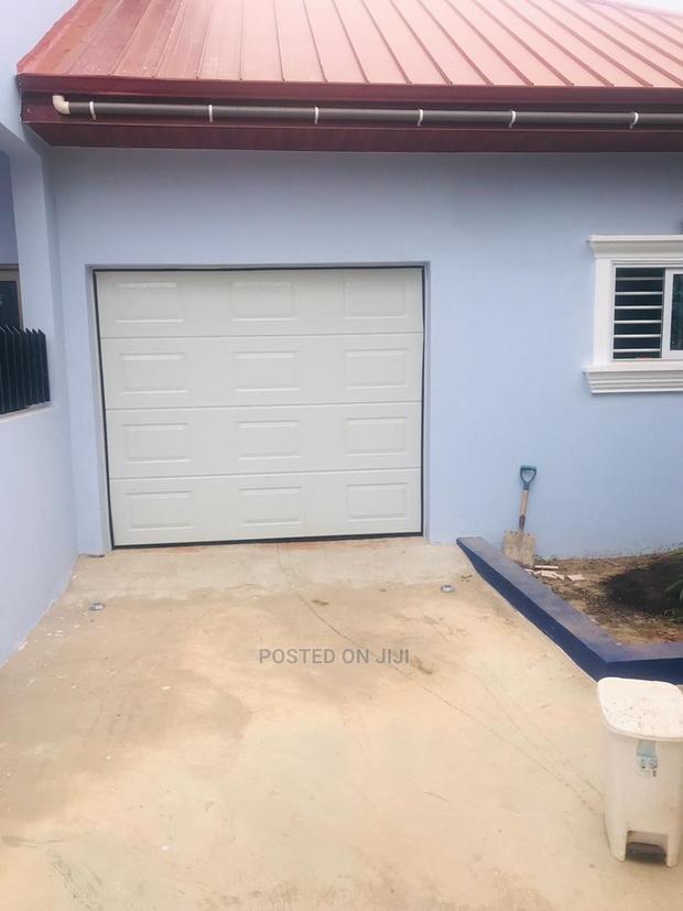 American Automatic Garage Door Now Available at Bluecity · Photo 6